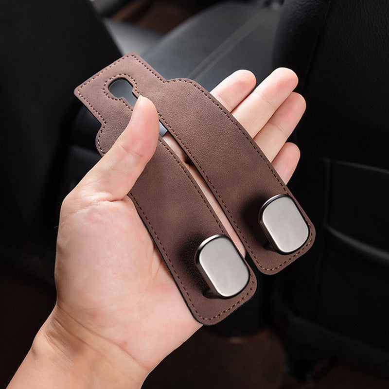 Kopfstützenhaken fürs Auto – Braun, in der Hand gehalten